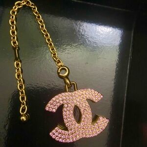 Chanel Gold-Tone Bag charm with Pink Crystal Logo Charm
